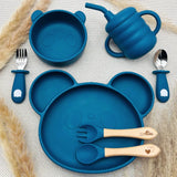 Coffret bébé bleu marine personnalisé : assiette ventouse, tasse, couverts et bol en silicone doux sans BPA.
