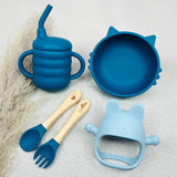 Coffret repas bébé bleu avec prénom Alba gravé, contenant gobelet, bol et jouet dentition en forme de chat. Cadeau bébé personnalisé original.