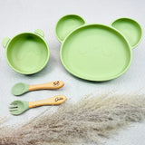 Vaisselle bébé personnalisée vert pastel, forme panda, avec bol, assiette, cuillère et fourchette prénom Gabin. Set complet et sans BPA.