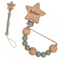 Tétine attachée avec clip étoile