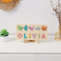 puzzle prénom OLIVIA bois dinosaures