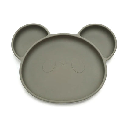 Zoom sur assiette bébé vert olive